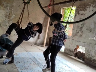 Two girls suspended in an abandoned house